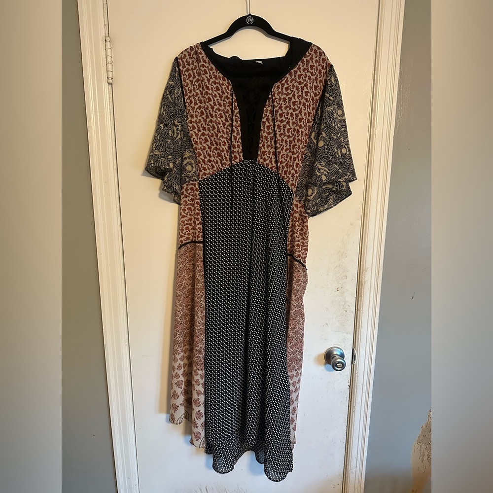Bohemian, multi patterned, free flowing dress.